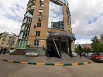 Две башни, круглая башня (Belinskogo Street, 32), centro de negocios