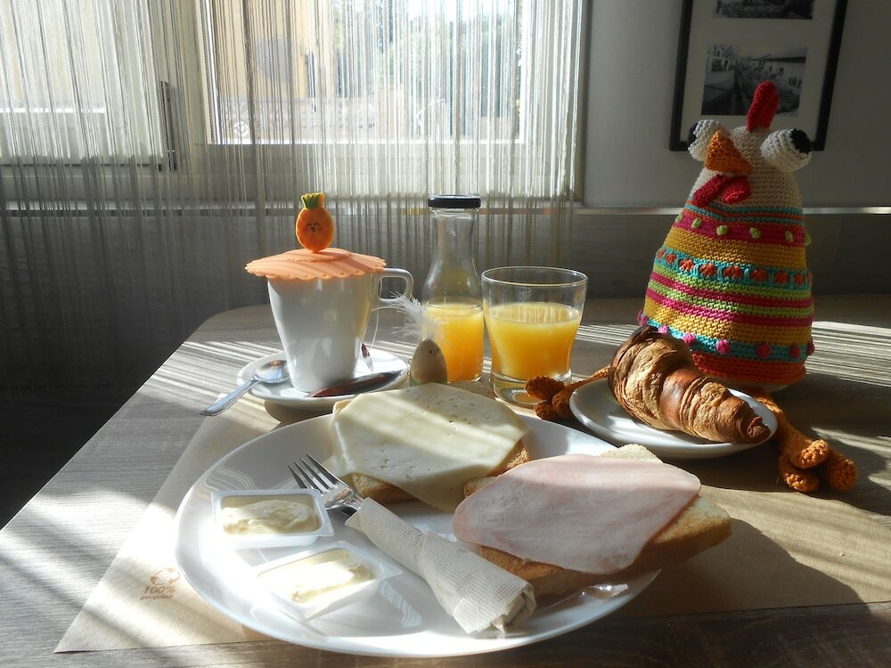 Фото Hostal El Callejon