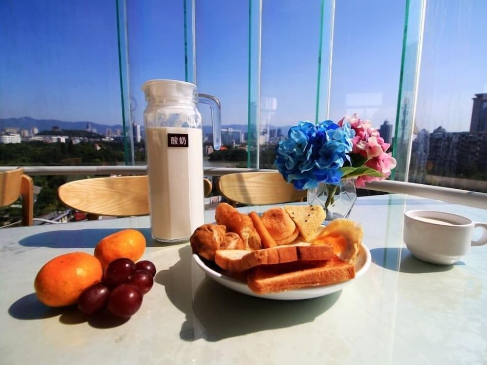 Фото GreenTree Inn Fuzhou Gushilou District North Xierhuan Road Zuohai park Express Hotel