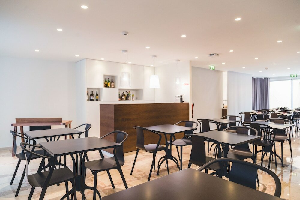 Фото Aveiro Center Hotel