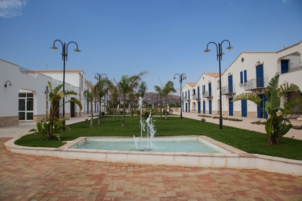 Фото Scala Dei Turchi Resort