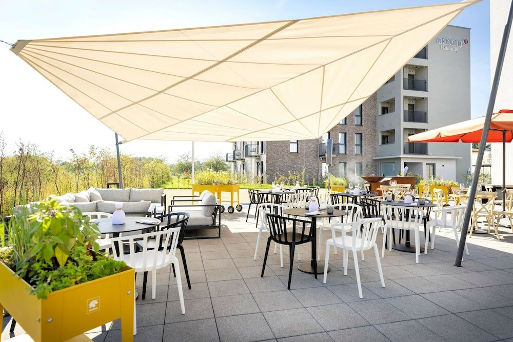 Фото Arcotel HafenCity Dresden