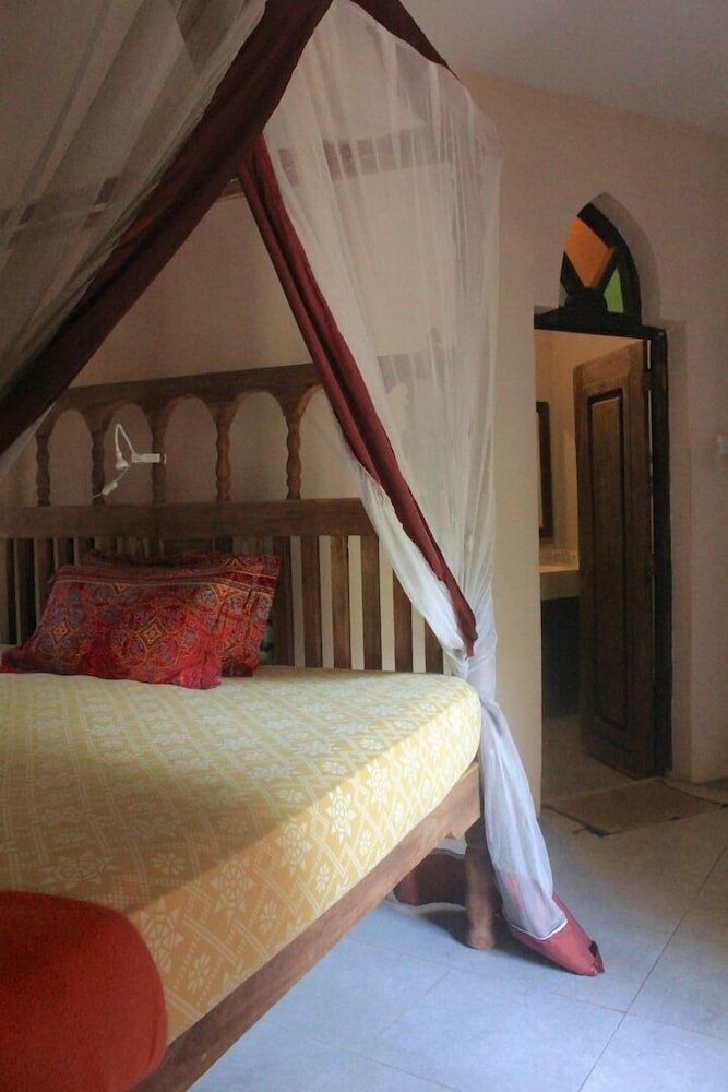 Фото Casa Umoja Guesthouse