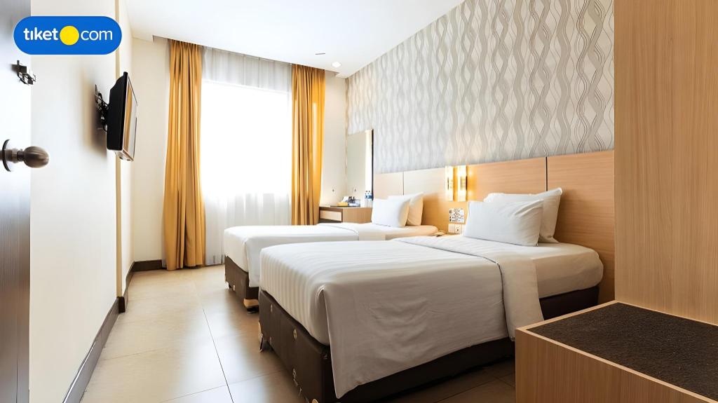 Фото Grand Impression Hotel Medan
