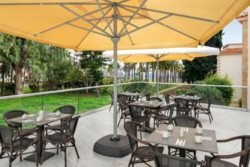 Гостиница Ramada Hotel & Suites by Wyndham Ayia Napa в Айя-Напе