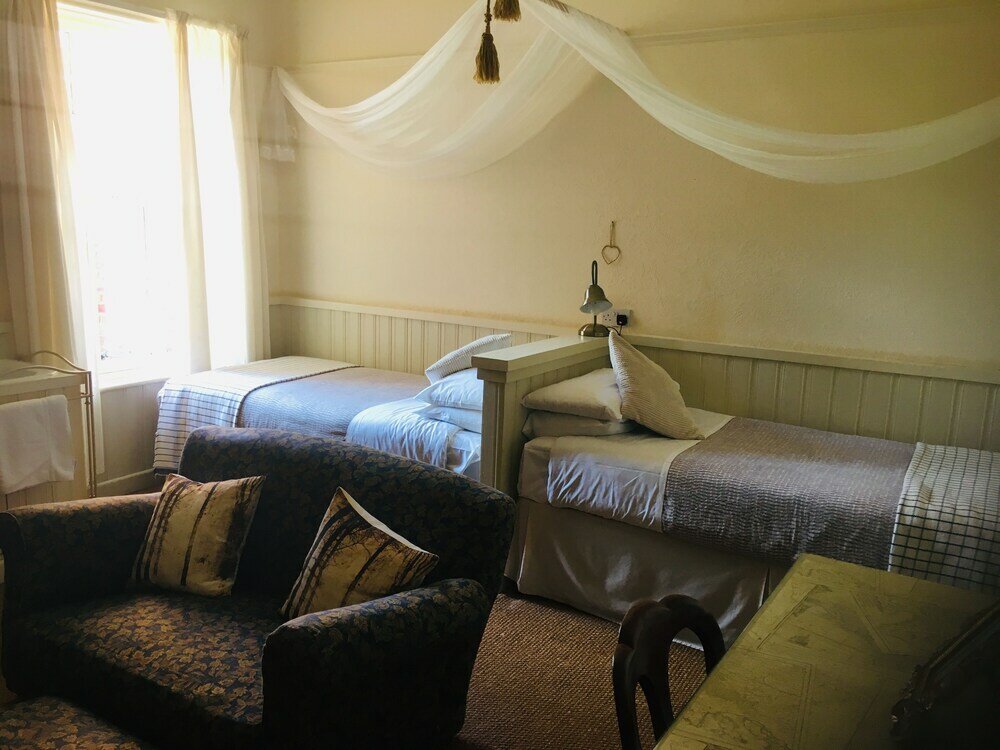 Фото Cornerstones Guest House