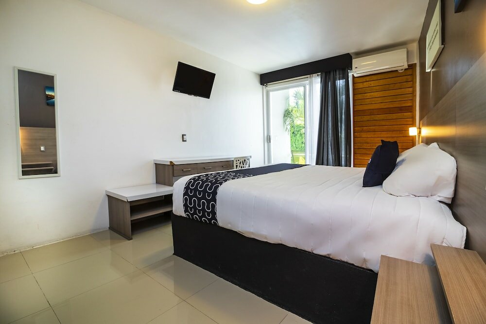 Фото Collection O Hotel Mango, Six Flags Hurricane Harbor Oaxtepec