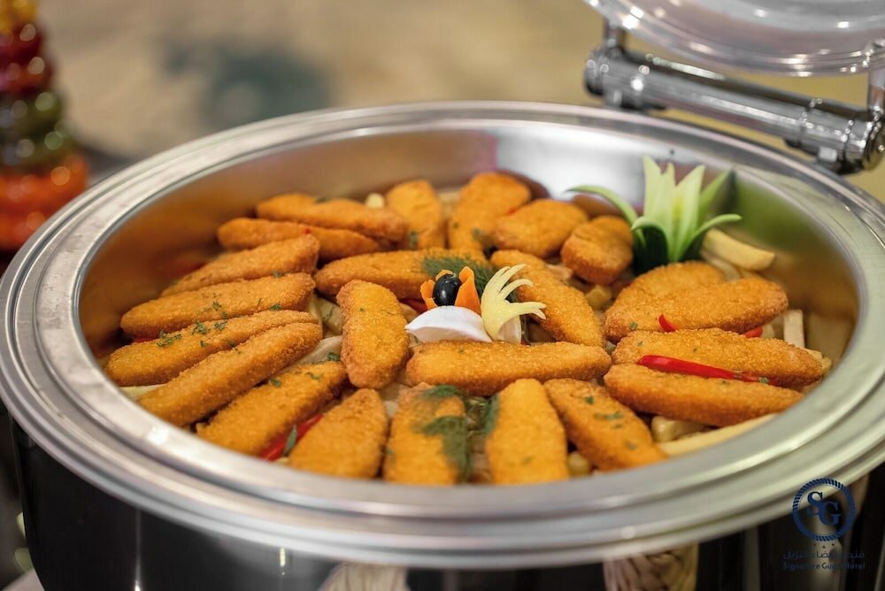 Фото Signature Guest Hotel