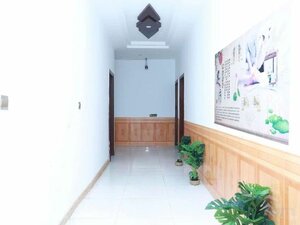 Baimu Nongju Chinese Inn (Village Group 2, Guanliping Residents Committee (20 meters west of Zhangjiajie International Tourism Commercial City)), hotel