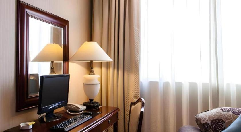 Фото Sun City Hotel Haikou