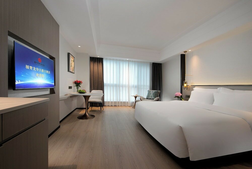 Фото Fuqinglong Huatian Holiday Hotel