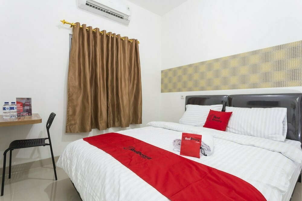 Hotel Reddoorz Plus Boulevard Residence Bsd, Earth, photo