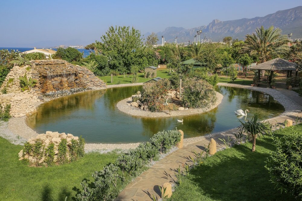 Фото Merit Crystal Cove Hotel