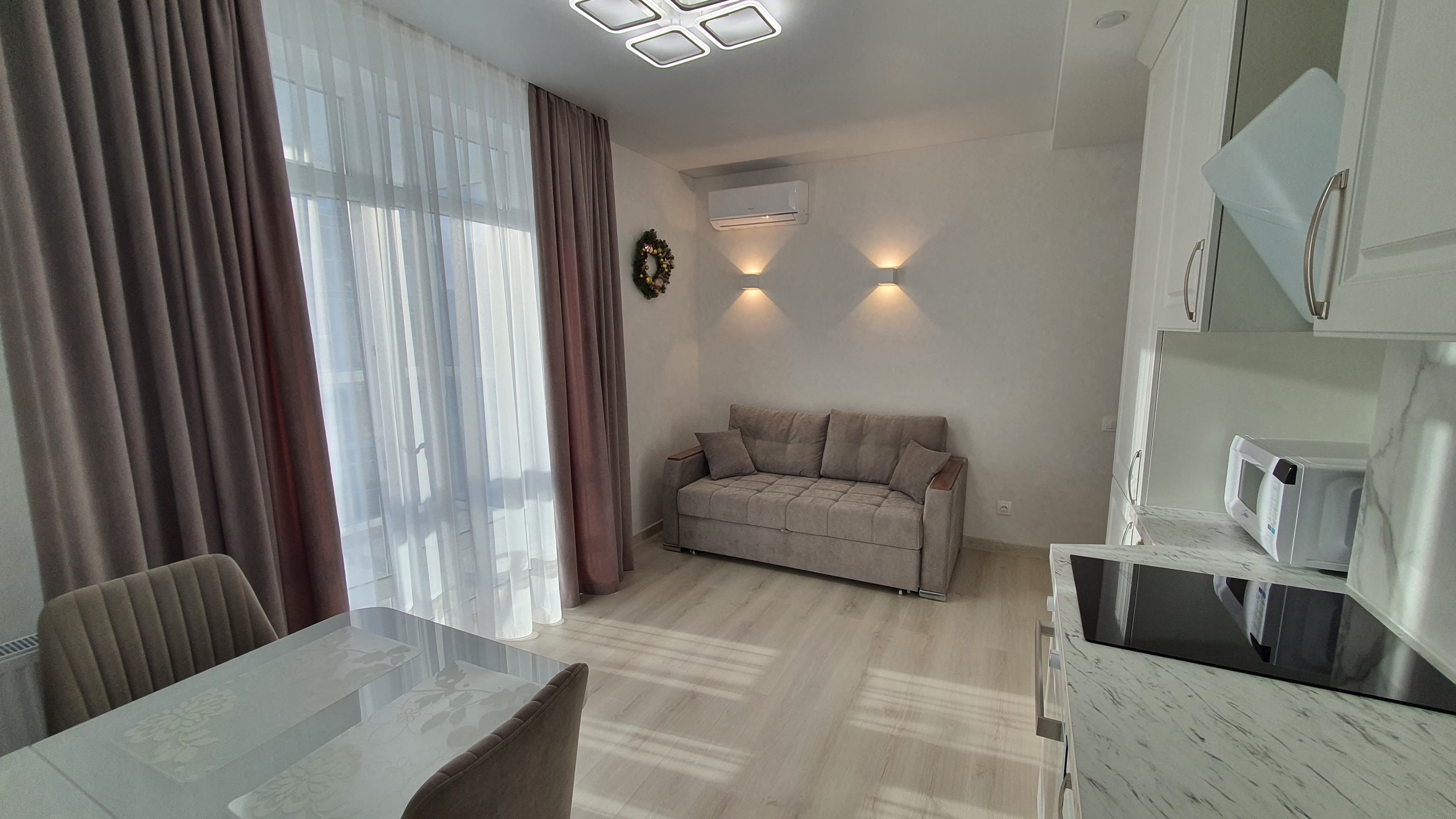 Фото Видовые апартаменты с парковкой около набережной и аквапарка Ривьера