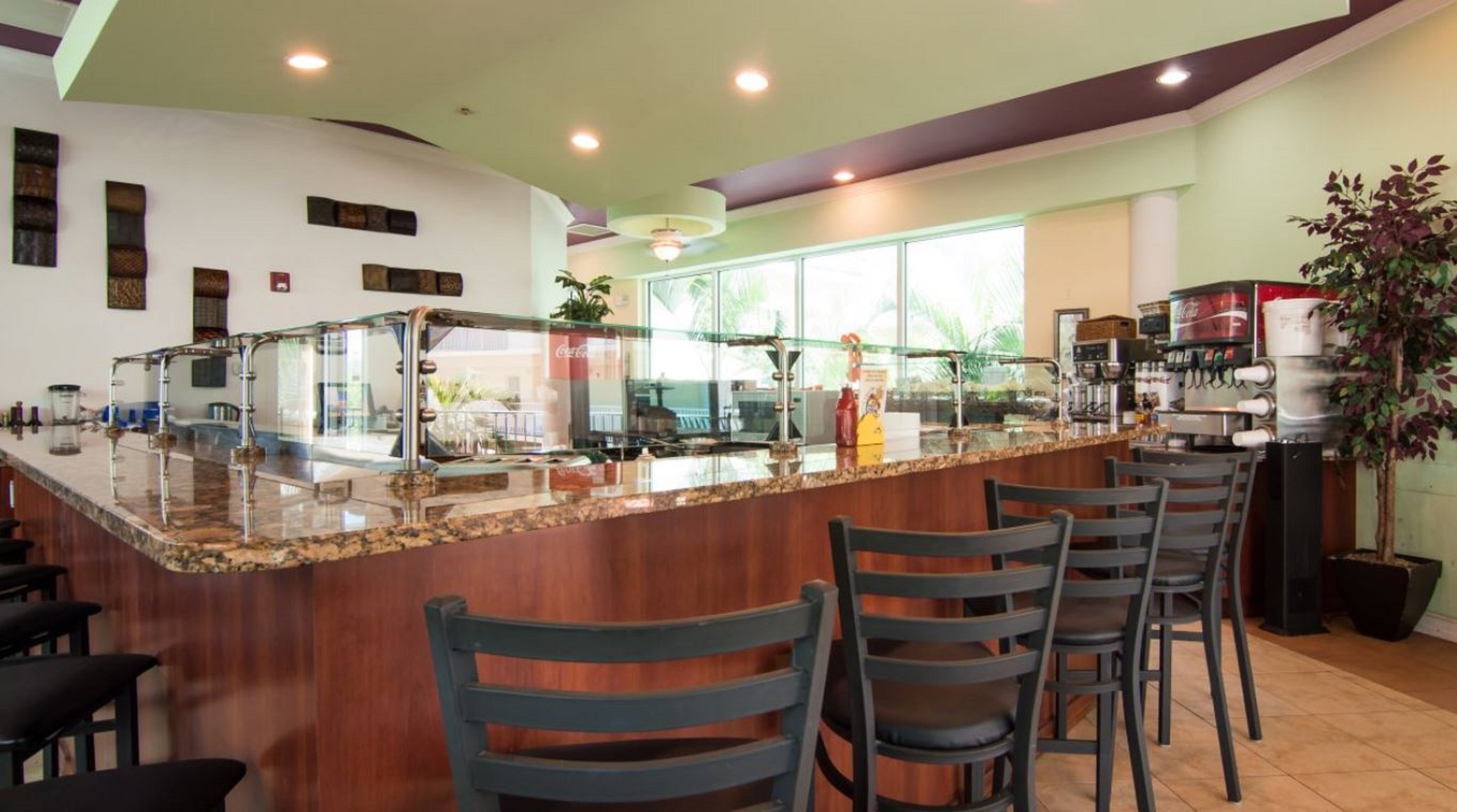 Фото Sunset Vistas Two Bedroom Beachfront Suites