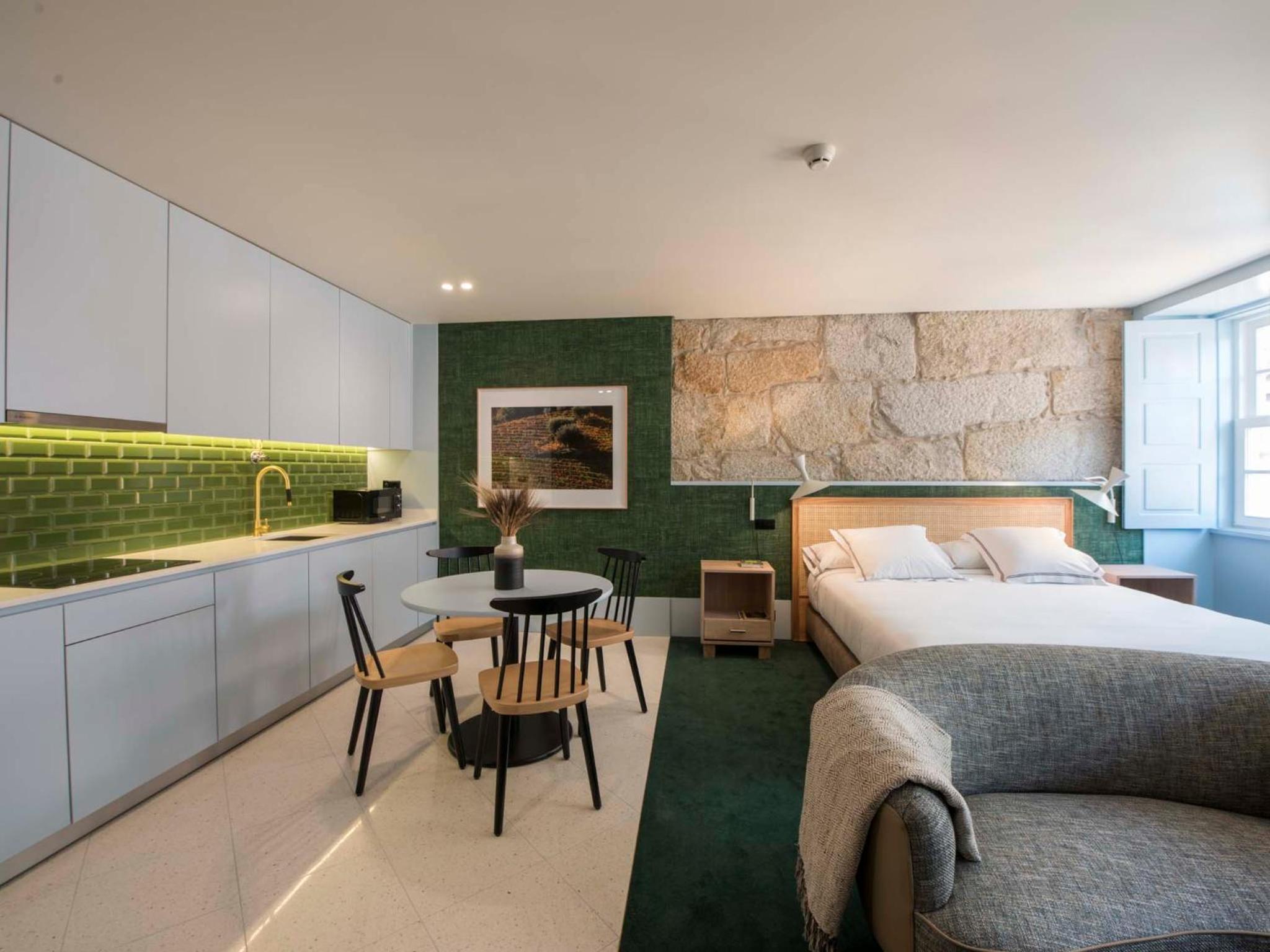 Фото Apartamentos The Arc Carrís