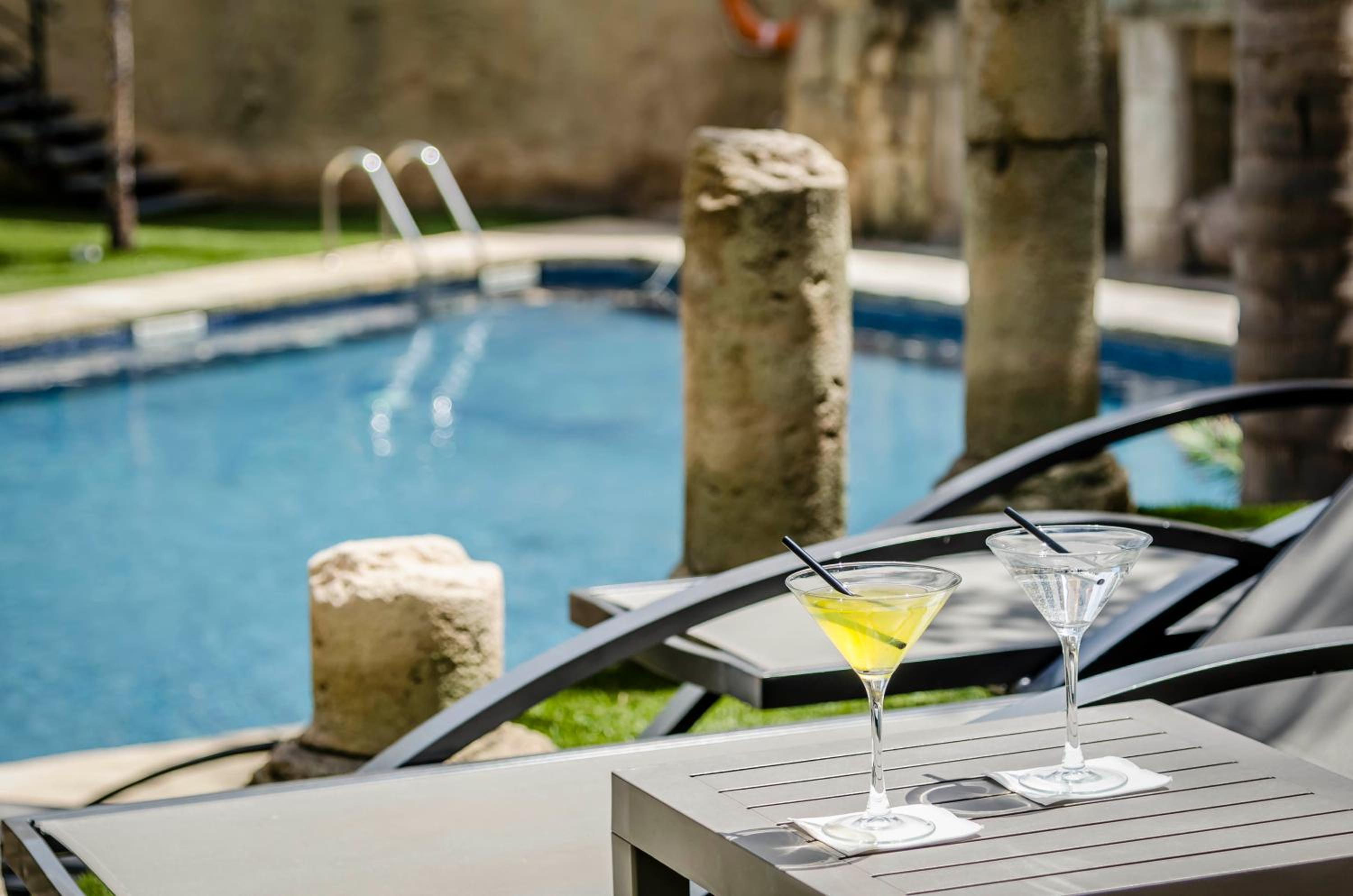 Фото Exe Cunit Suites & SPA
