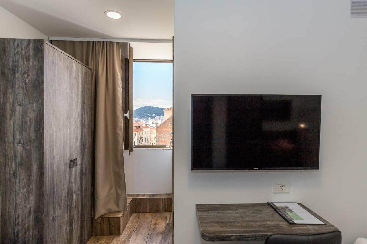 Фото Apinelo Tower Rooms