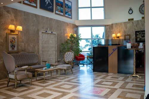 Апартаменты Turkan Beachfront Apartment в Бодруме