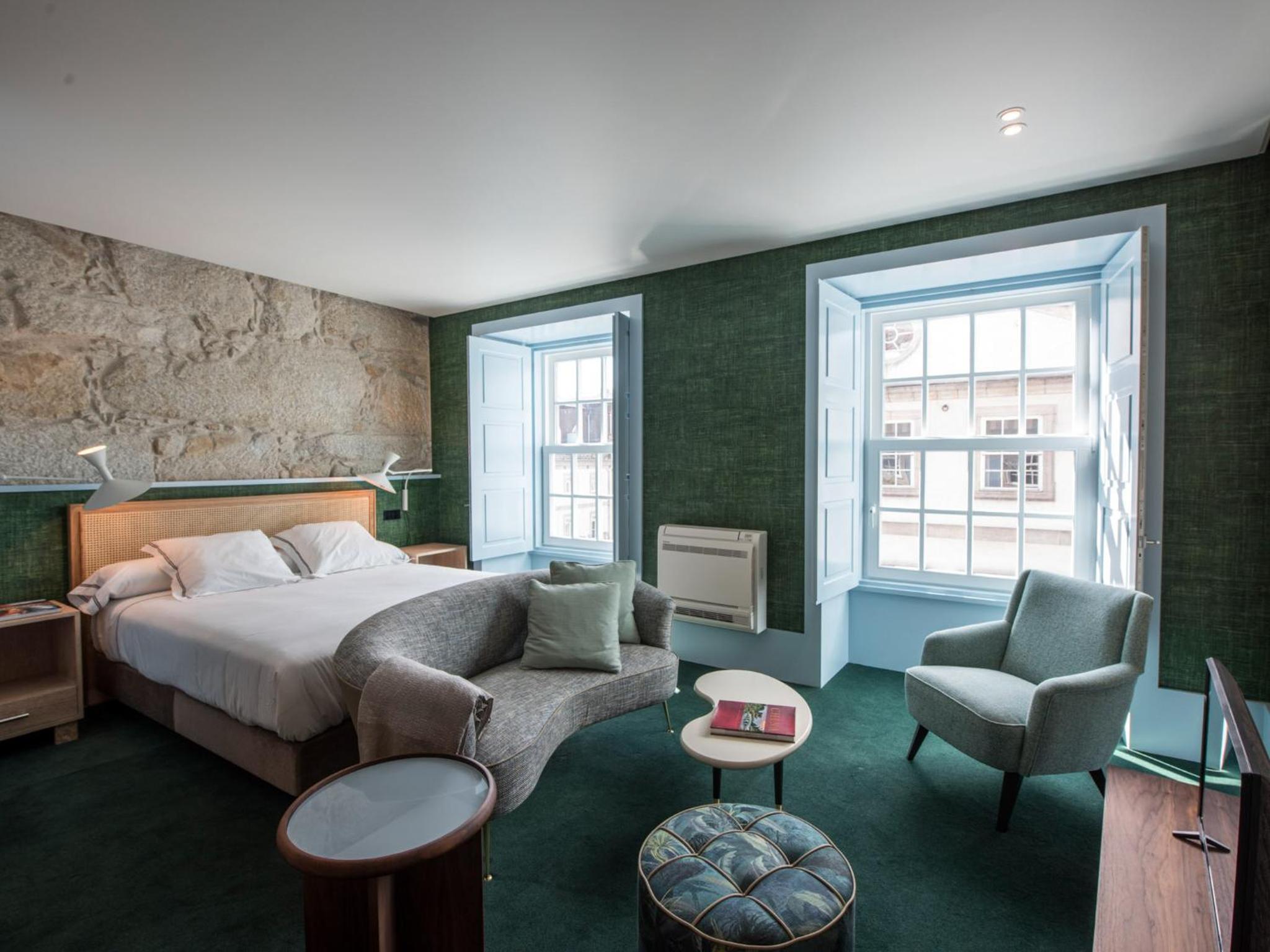 Фото Apartamentos The Arc Carrís