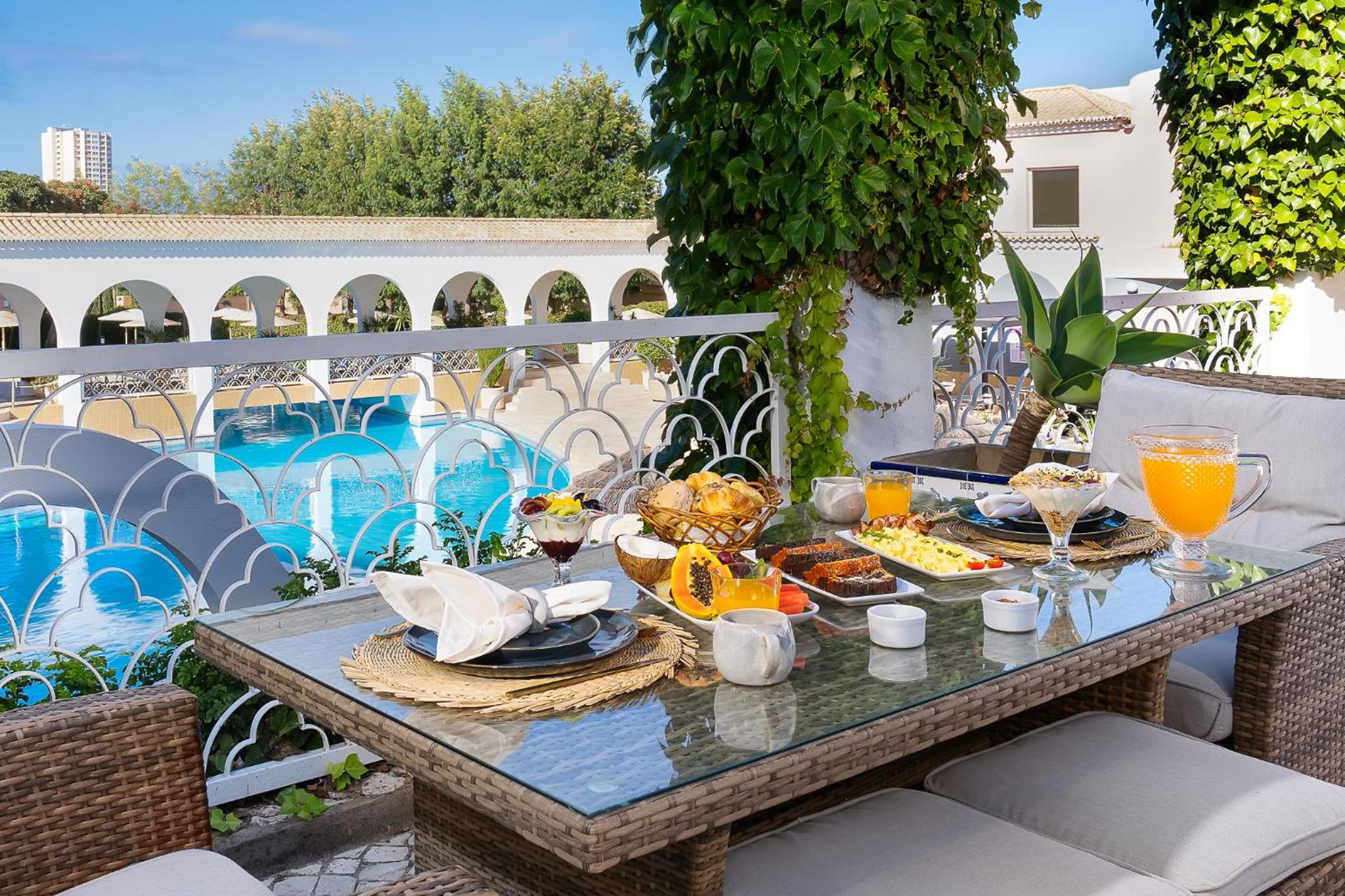 Фото Apartamentos Turísticos Clube Vilarosa