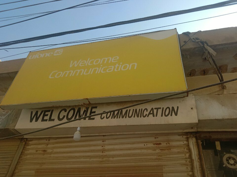 Mobile phone store Welcome, Karachi, photo