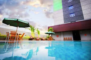 Гостиница Ayola First Point Hotel Pekanbaru в Паканбару