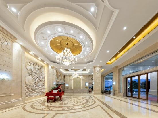 Фото Auden International Hotel