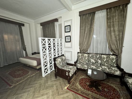 Фото Cosmopolitan Plaza Inn Hotel