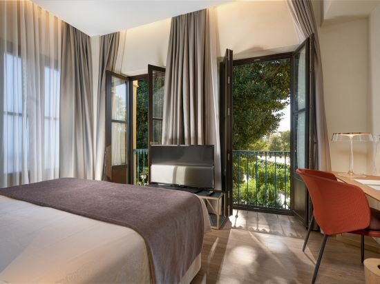 Фото Suites Murillo Plaza Sta Cruz