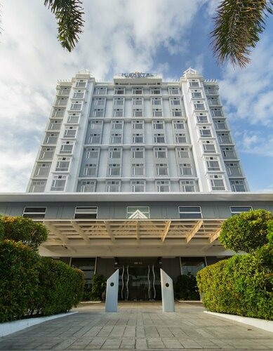 Внешний вид отеля Microtel by Wyndham Mall of Asia в Пасае, фото 1