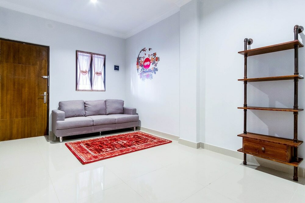 Фото Oyo 283 Helvetia Residence