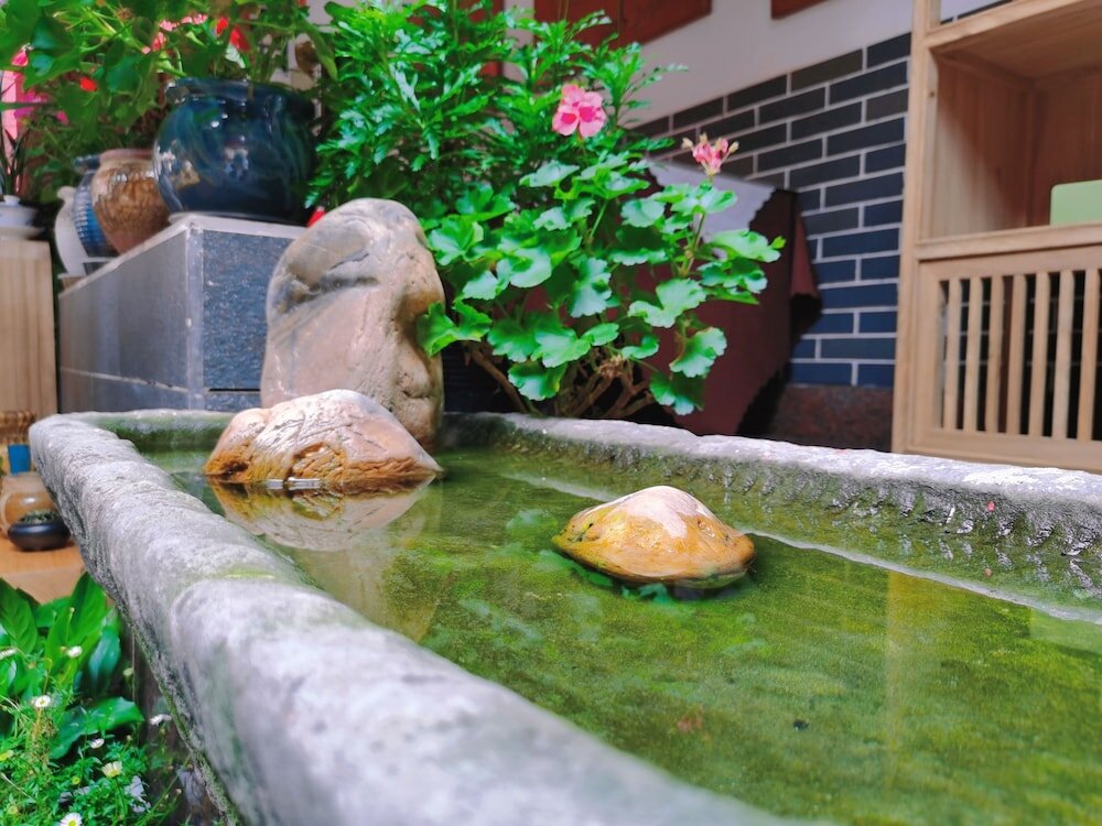 Фото Chengdu Wenjun courtyard Hotel