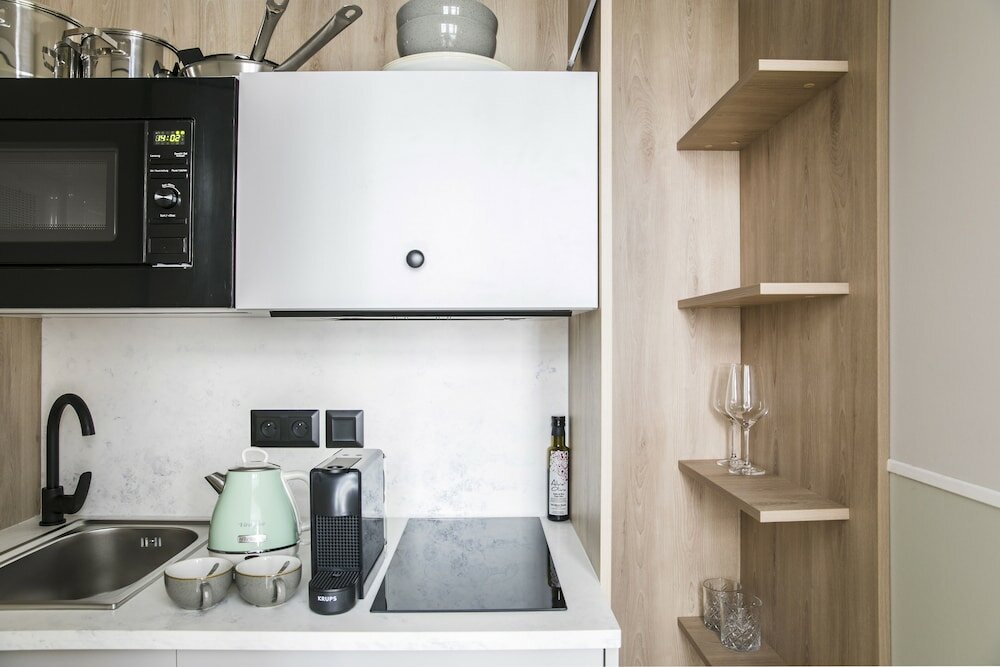 Фото Numa i Flow Rooms & Apartments