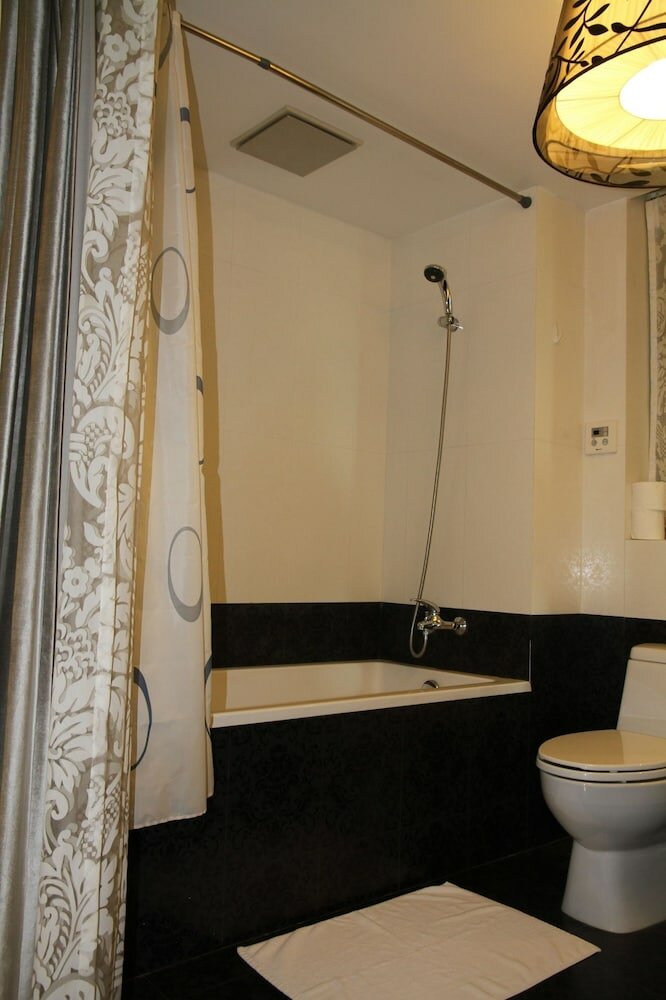 Фото Shanghai Abest Xinshikong Apartments