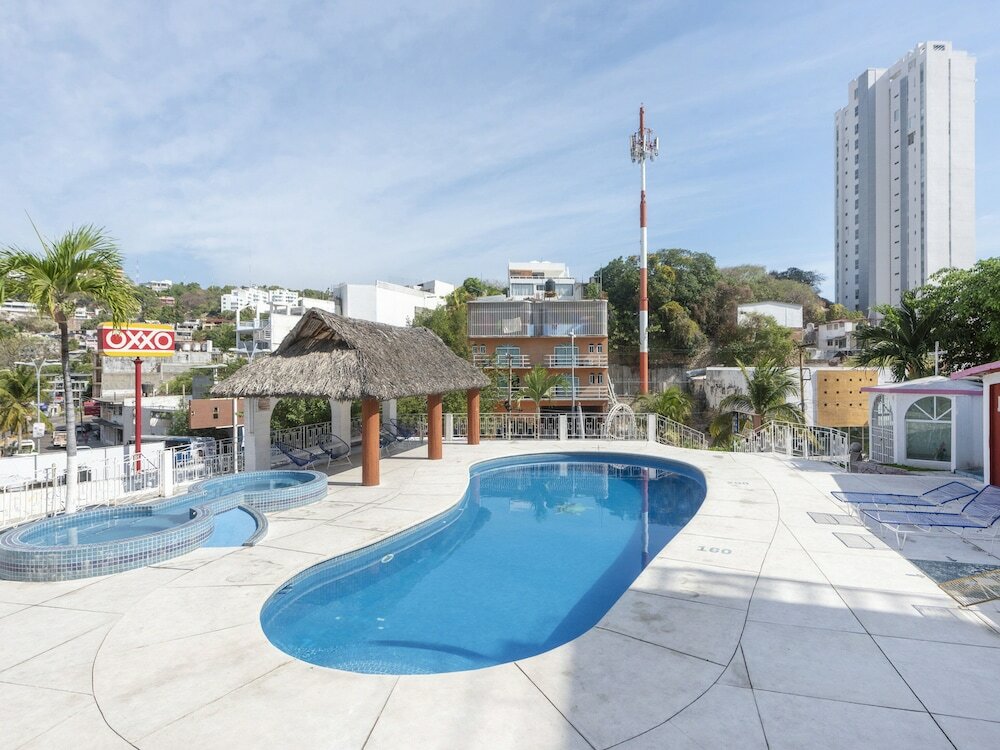 Фото Capital O Hotel El Mejicano