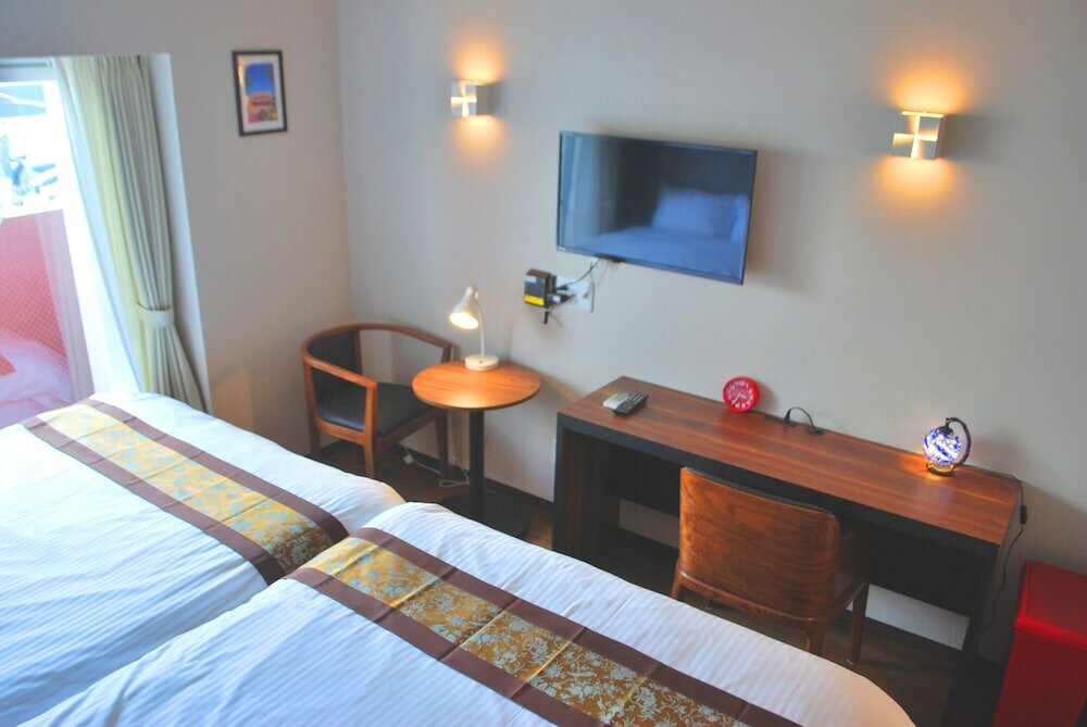 Фото Ten Point Hotel