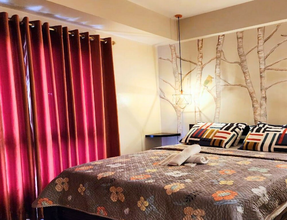 Фото Tess and Tessha Condotel near T3 Airport