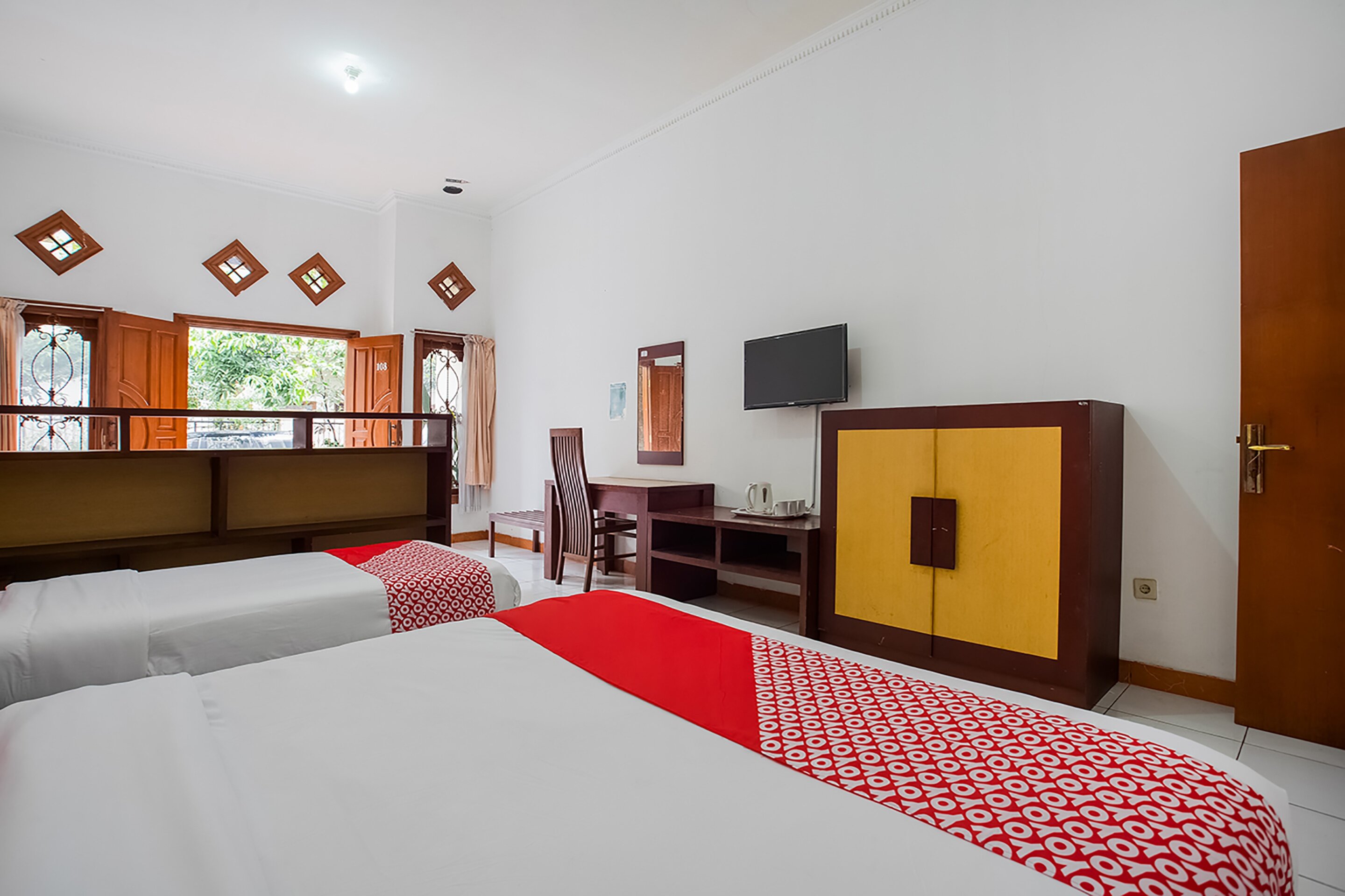 Фото Super Oyo 3406 Pandu Prima Guest House Syariah