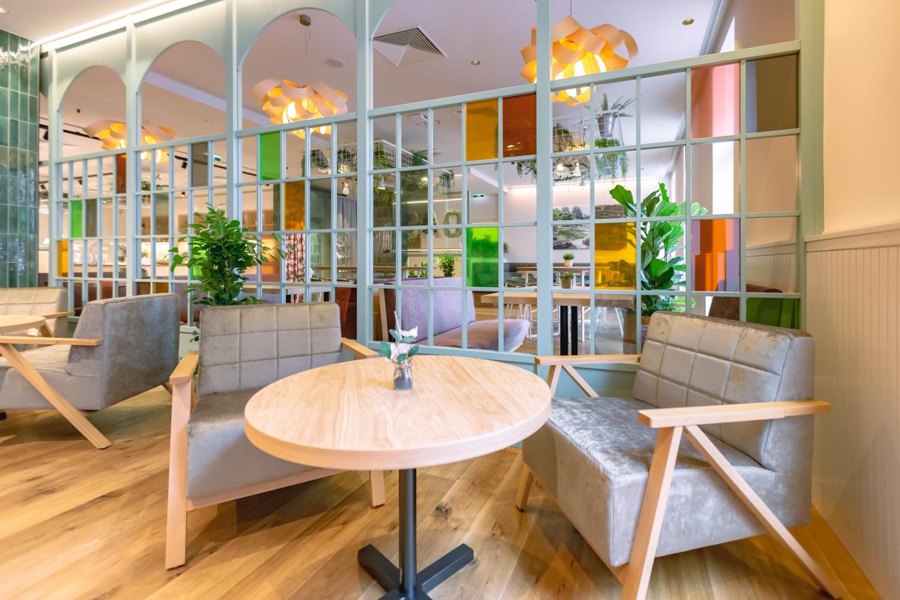 Фото Stadtoase Kolping Hotel