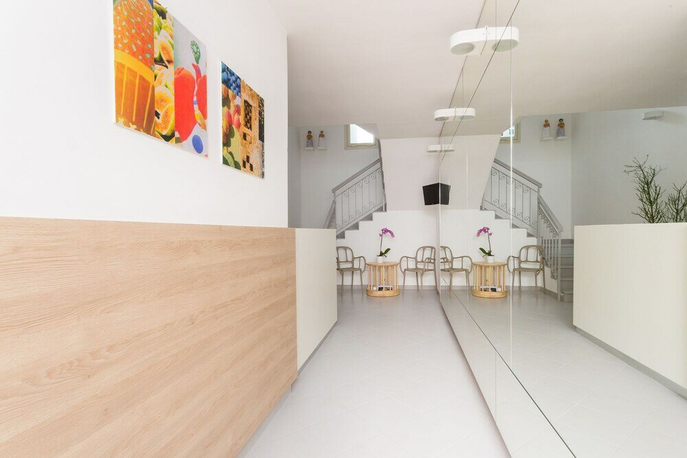 Фото Hotel L'Uomo e il Mare