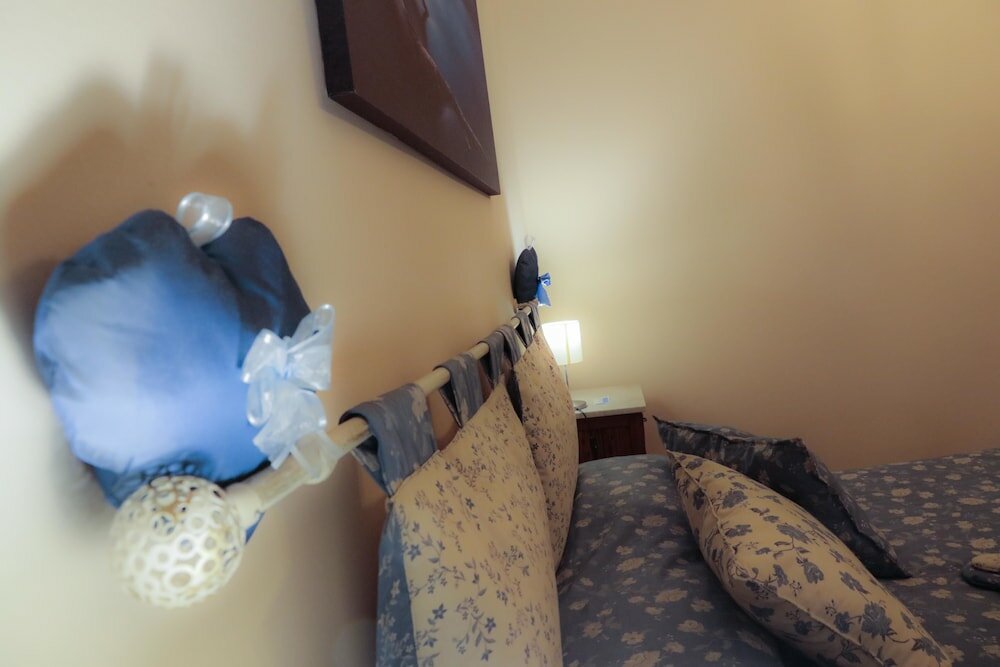 Фото Le Finestre Sul Borgo Rooms