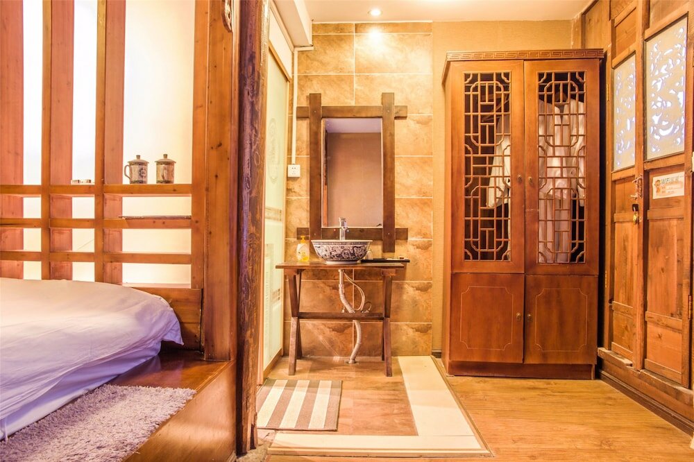 Фото Lijiang Xueshanyu Inn