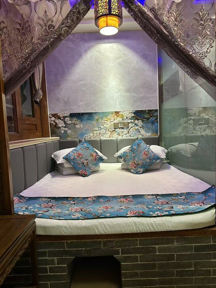 Фото Pingyao Hongyuyuan Inn