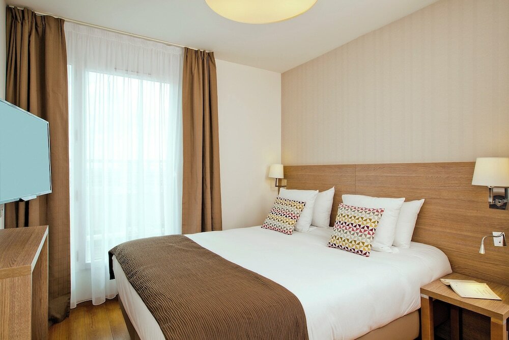 Фото Residhome Appart Hotel Monceau