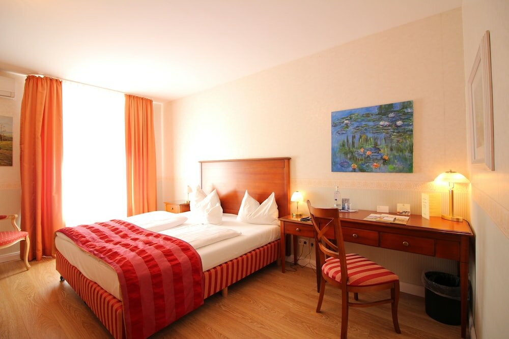 Фото Hotel am Mühlenteich