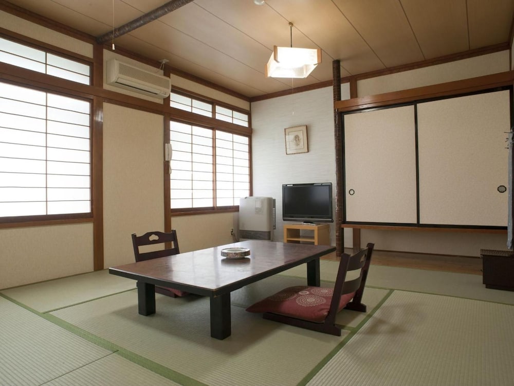 Фото Kusatsu Onsen Kiyoshigekan