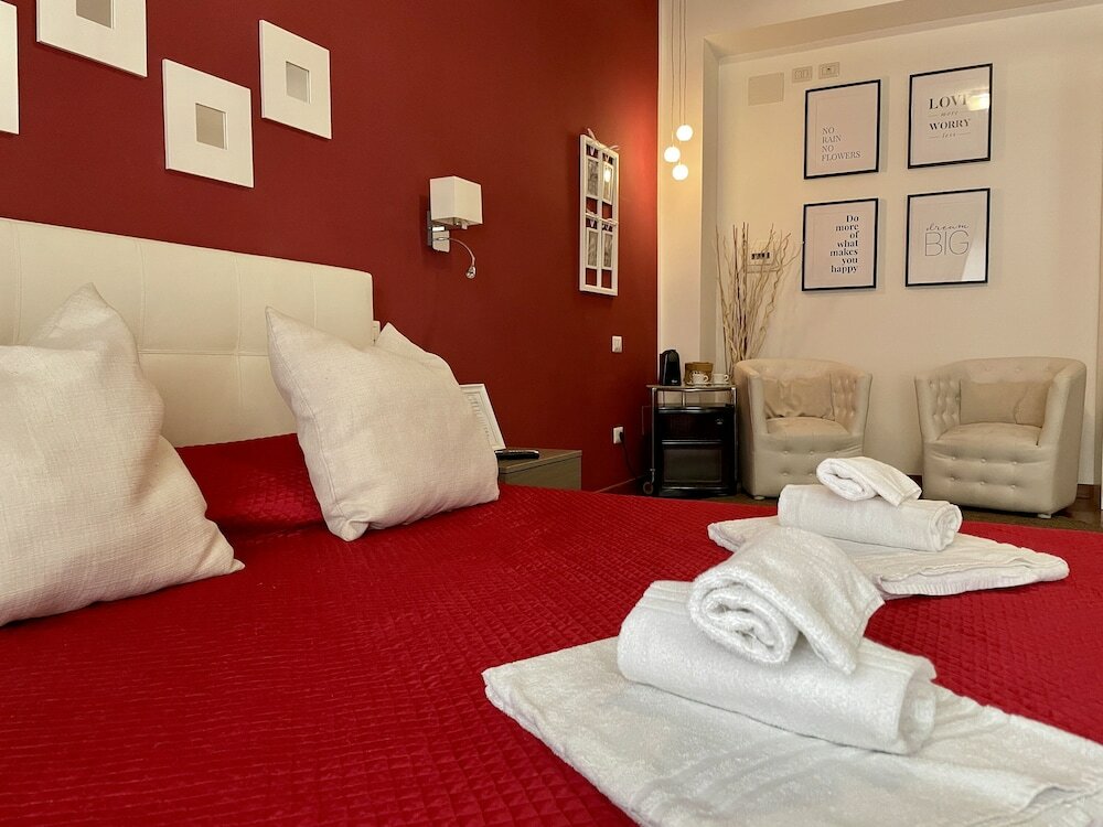 Фото Le Coq Rooms&Suite