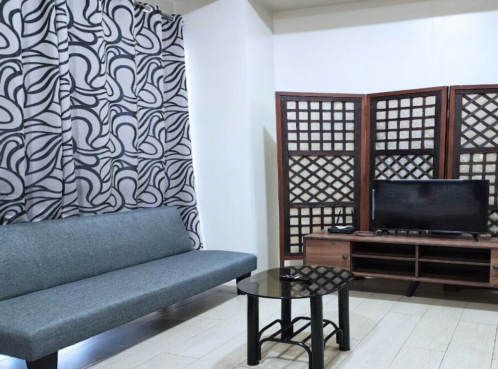 Фото Tess and Tessha Condotel near T3 Airport