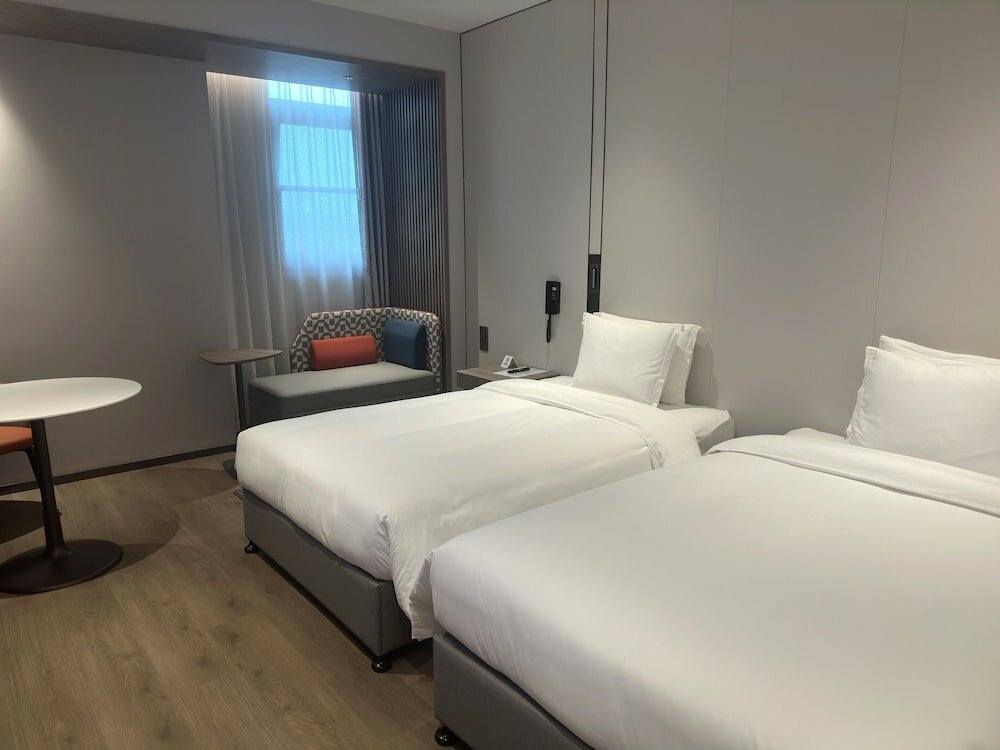 Фото Holiday Inn Express Shanghai Hongqiao Necc, an Ihg Hotel